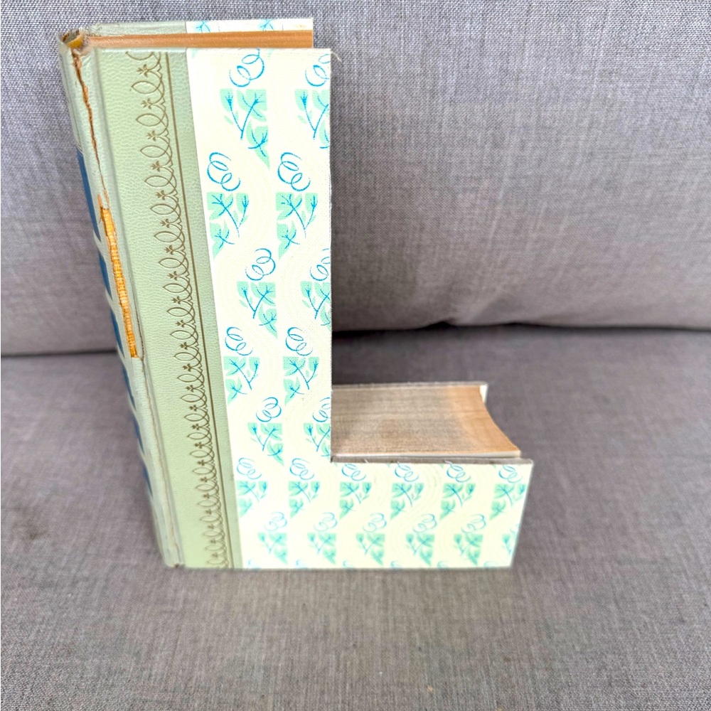 Initial “L” made out of a Book